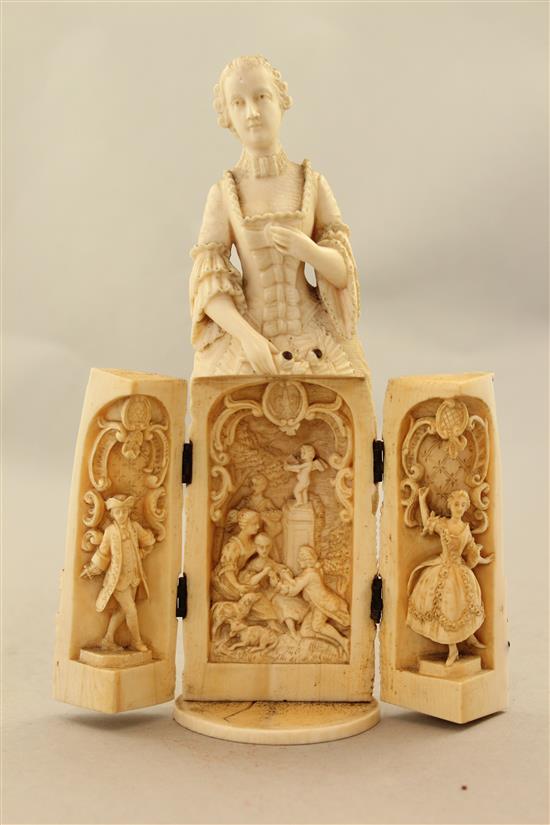 A 19th century Dieppe carved ivory triptych figure, 8in.
